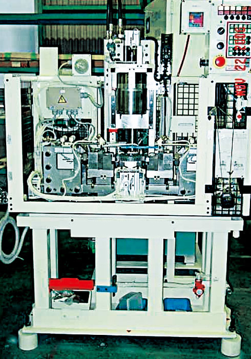 スナップ加工機